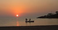 Fishing at sunset at La Boca: View from Villa Rio-Mar
